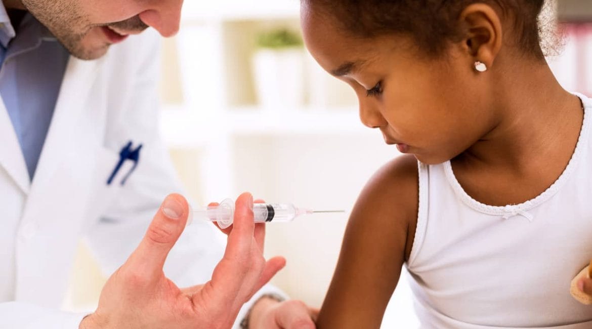 child getting immunized