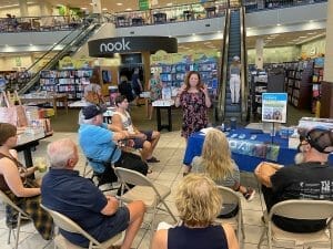 Hilary Talking at book tour boca