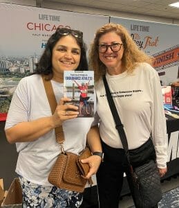 Hilary Topper with woman who bought book
